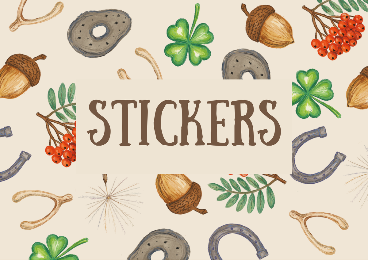 Stickers collection banner featuring acorns, horseshoes, clovers, berries and wishbones on a cream background