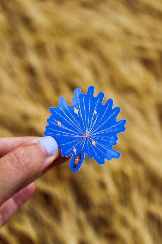 Floating thistle seed sticker